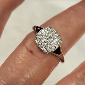 Two CZ rings.  One sterling silver.